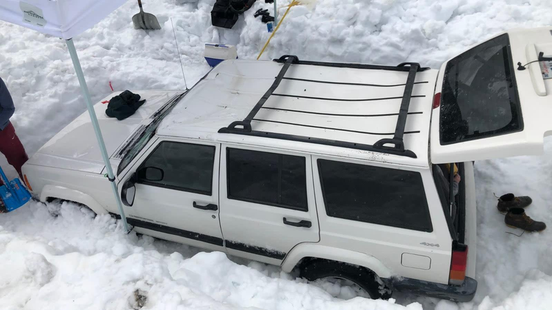 Illustration for article titled A Tesla Engineer's Jeep Ended Up Under 10 Feet of Snow for Months and It's Still There
